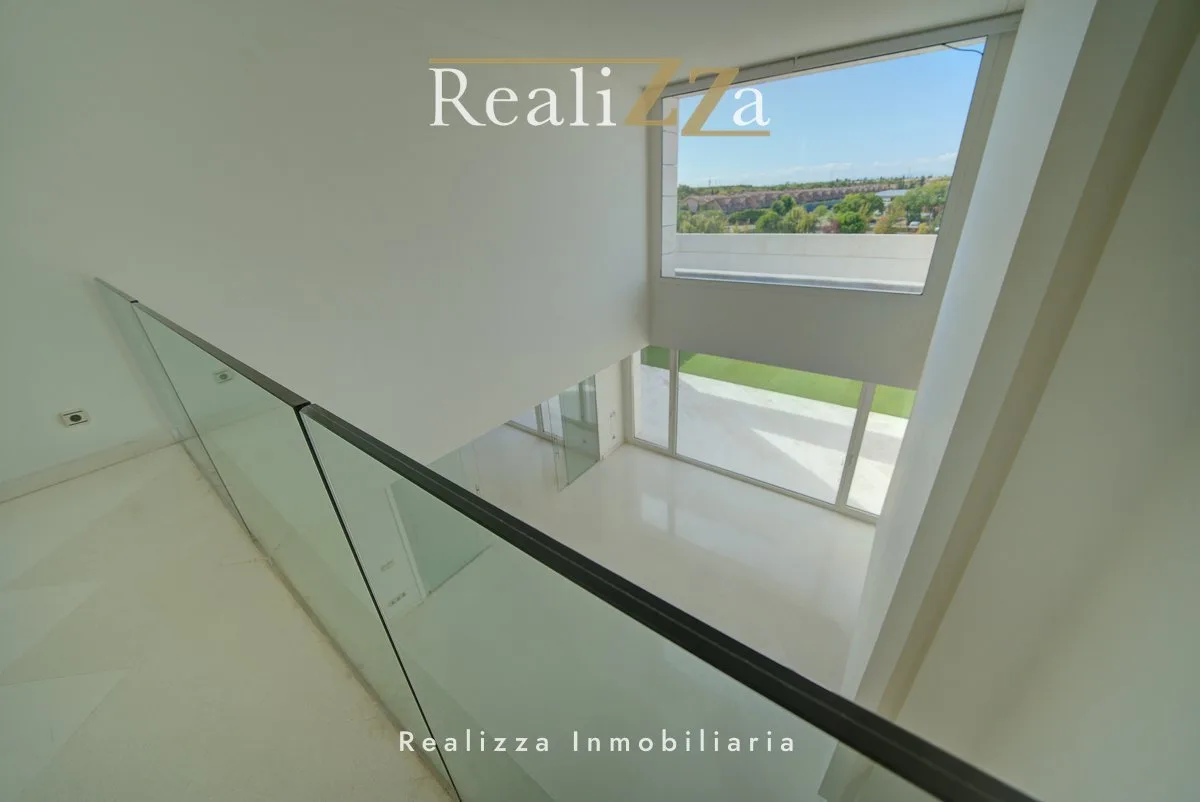 Adosado de primera linea 23